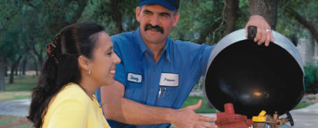 Henderson Oil and Propane employee with customer